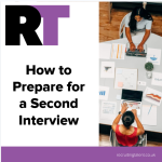 Three interviewers across a table from a candidate in a bright office